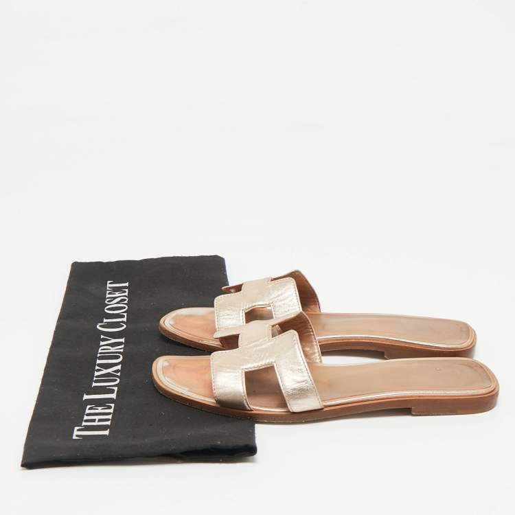 Pre Owned Hermes Metallic Bronze Leather Oran Flat Slides Size 36