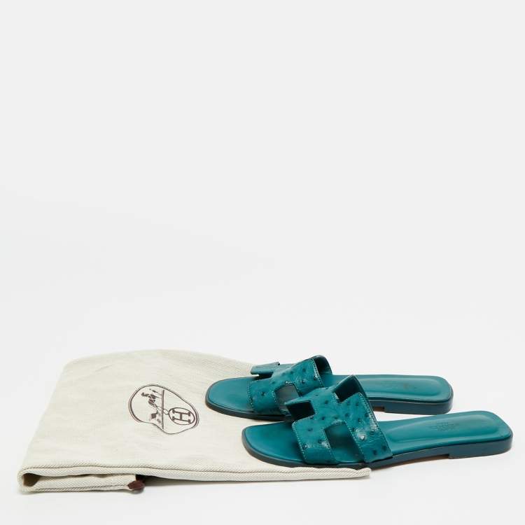Pre Owned Hermes Blue Ostrich Leather Oran Flat Slides Size 38