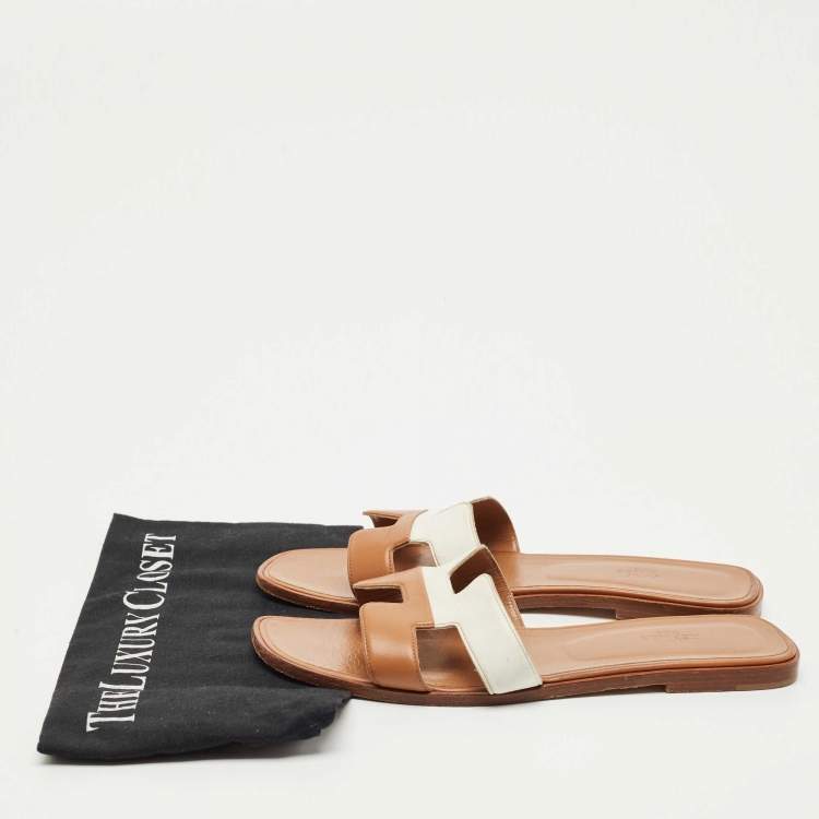 Pre Owned Hermes Brown/White Leather Oran Flat Slide Sandals Size 41