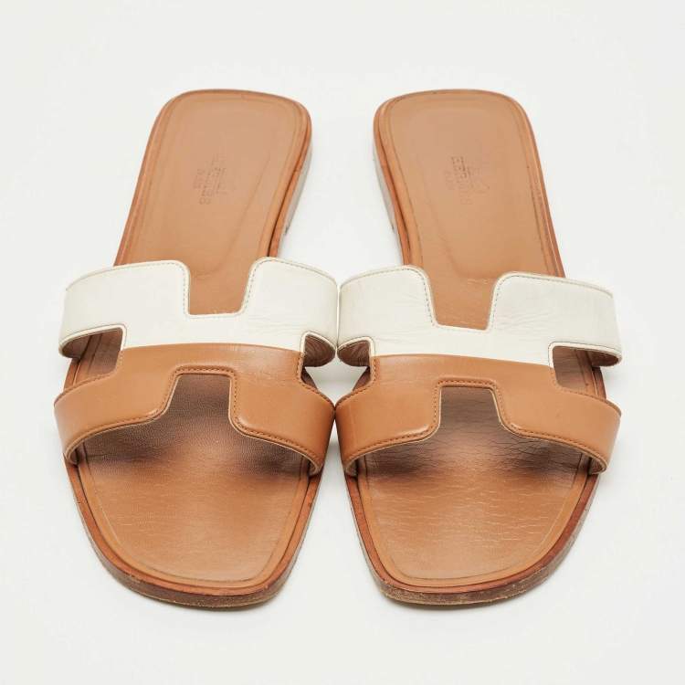 Pre Owned Hermes Brown/White Leather Oran Flat Slide Sandals Size 41