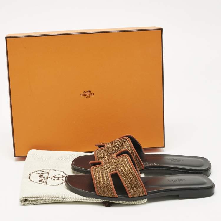 Pre Owned Hermes Gold/Black Suede Oran Dabka Flat Slides Size 38