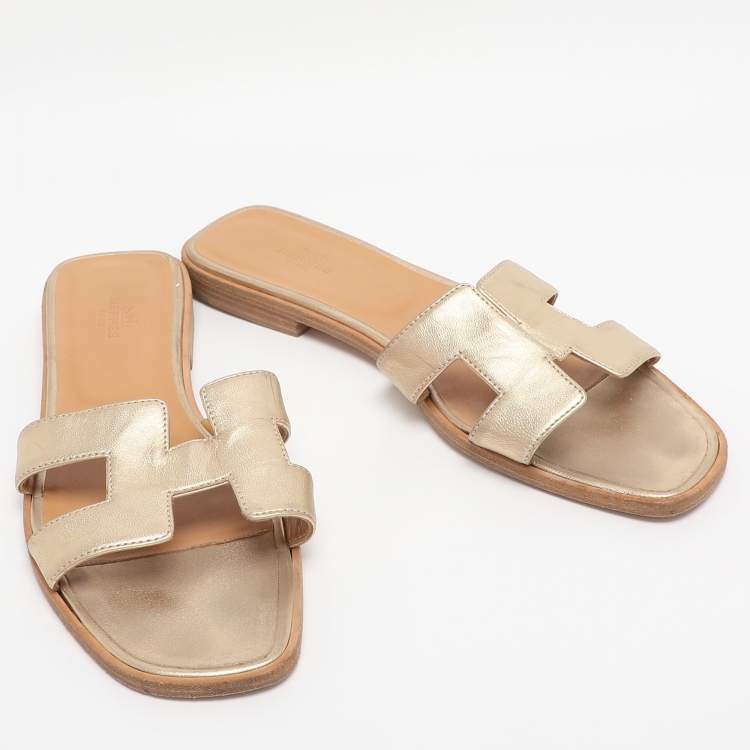 Pre Owned Hermes Gold Leather Oran Flat Slides Size 40