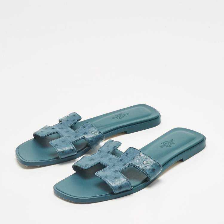 Pre Owned Hermes Blue Ostrich Leather Oran Flat Slide Size 38