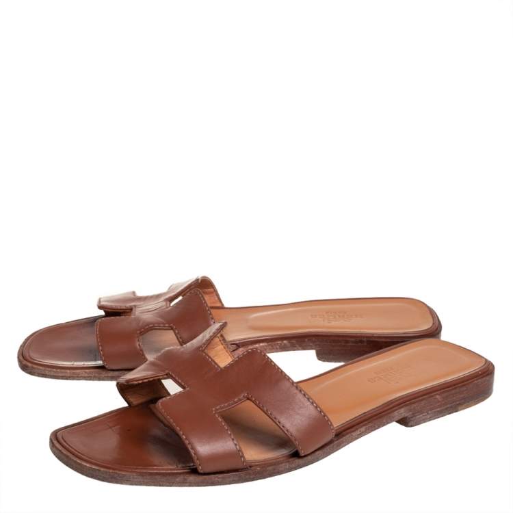Pre Owned Hermes Brown Leather Oran Flat Slides Size 36.5