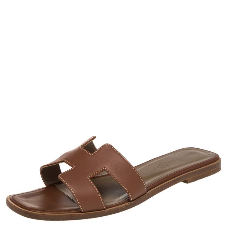 Pre Owned Hermes Brown Leather Oran Flat Slides Size 36.5