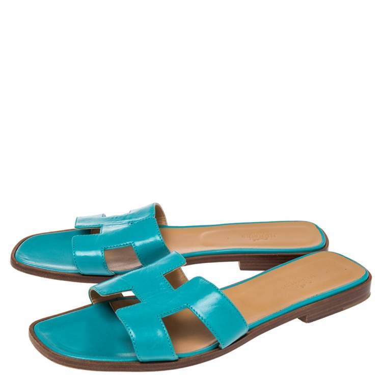 Pre Owned Hermes Blue Leather Oran Slide Flats Size 40.5