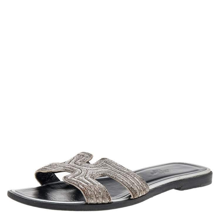 Pre Owned Hermes Silver Twisted Metal Thread Oran Flat Slides Size 36
