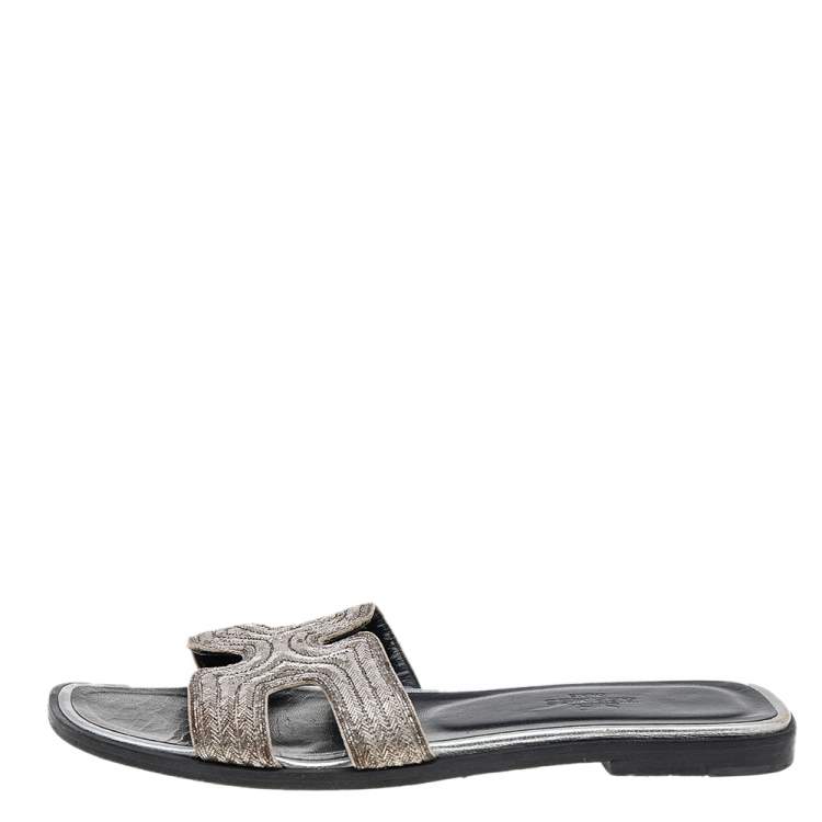 Pre Owned Hermes Silver Twisted Metal Thread Oran Flat Slides Size 36