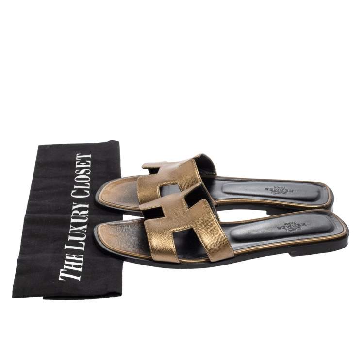 Pre Owned Hermes Gold Leather Oran Flat Sandals Size 38