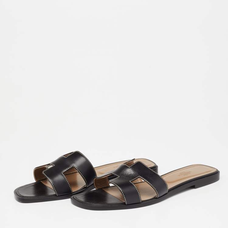 Hermes Black Leather Oran Flat Sandals Size 41.5 Hermes | The Luxury Closet