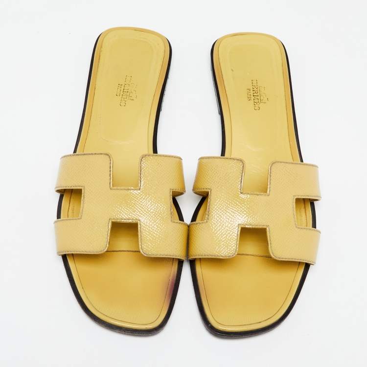 Pre Owned Hermes Yellow Patent Leather Oran Flat Slides Size 40.5