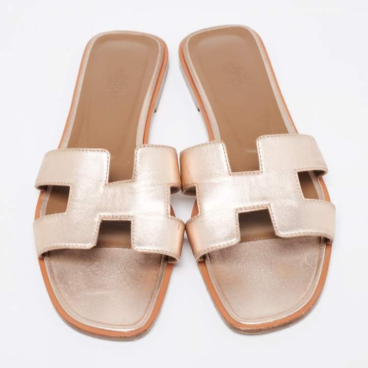 Pre Owned Hermes Rose Gold Leather Oran Flat Slides Size 39.5
