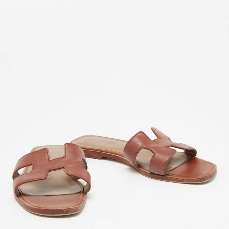 Pre Owned Hermes Brown Leather Oran Flat Slides Size 37.5