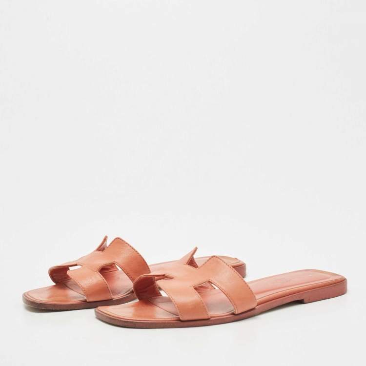 Pre Owned Hermes Orange Leather Oran Flat Slides Size 38.5