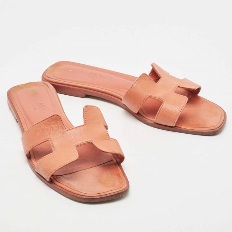 Pre Owned Hermes Orange Leather Oran Flat Slides Size 38.5