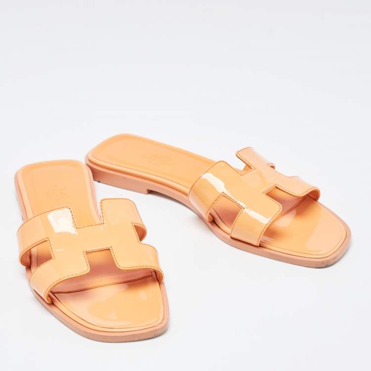 Pre Owned Hermes Orange Patent Leather Oran Flat Slides Size 36