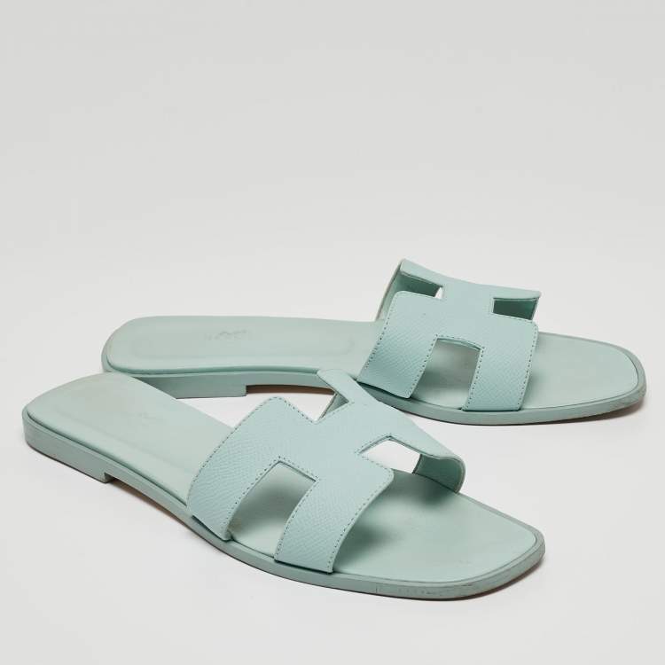Pre Owned Hermes Light Blue Leather Oran Flat Slides Size 40.5