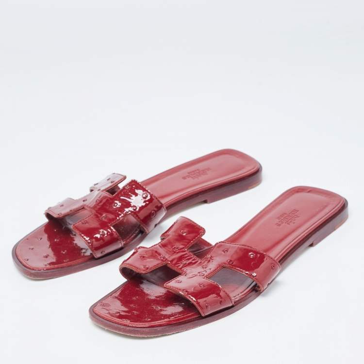 Pre Owned Hermes Burgundy Patent Ostrich Oran Flat Slides Size 39