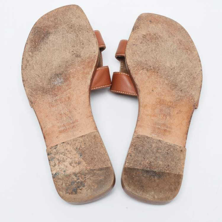 Pre Owned Hermes Tan Leather Oran Flat Slides Size 34.5