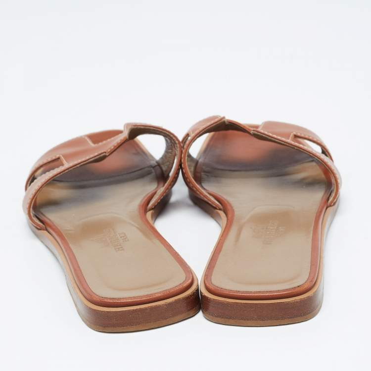 Pre Owned Hermes Tan Leather Oran Flat Slides Size 34.5