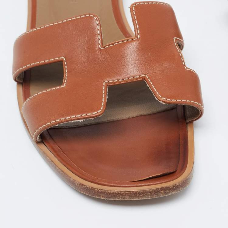 Pre Owned Hermes Tan Leather Oran Flat Slides Size 34.5