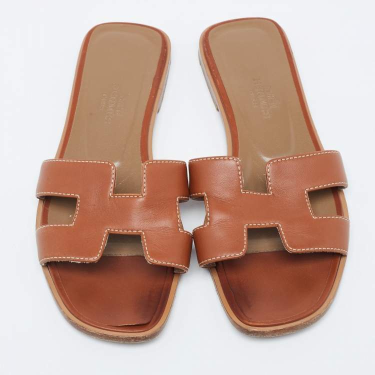 Pre Owned Hermes Tan Leather Oran Flat Slides Size 34.5
