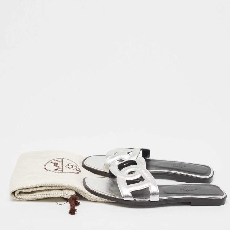 Pre Owned Hermes Silver Leather Omaha Flat Slides Size 38