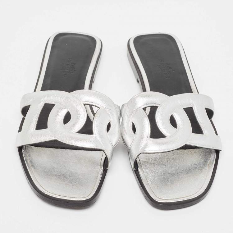 Pre Owned Hermes Silver Leather Omaha Flat Slides Size 38
