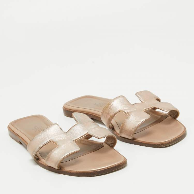 Pre Owned Hermes Metallic Gold Leather Oran Flat Slides Size 39