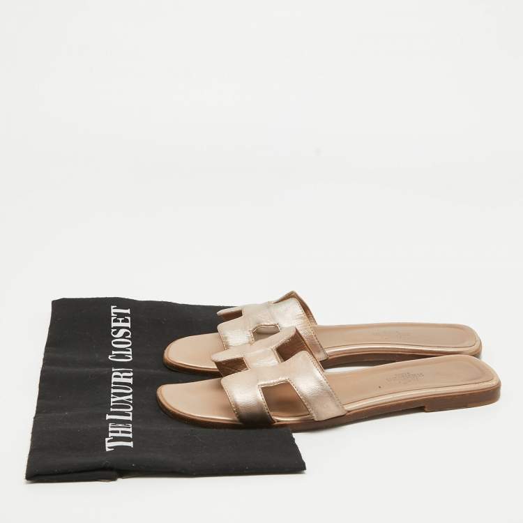 Pre Owned Hermes Metallic Gold Leather Oran Flat Slides Size 39
