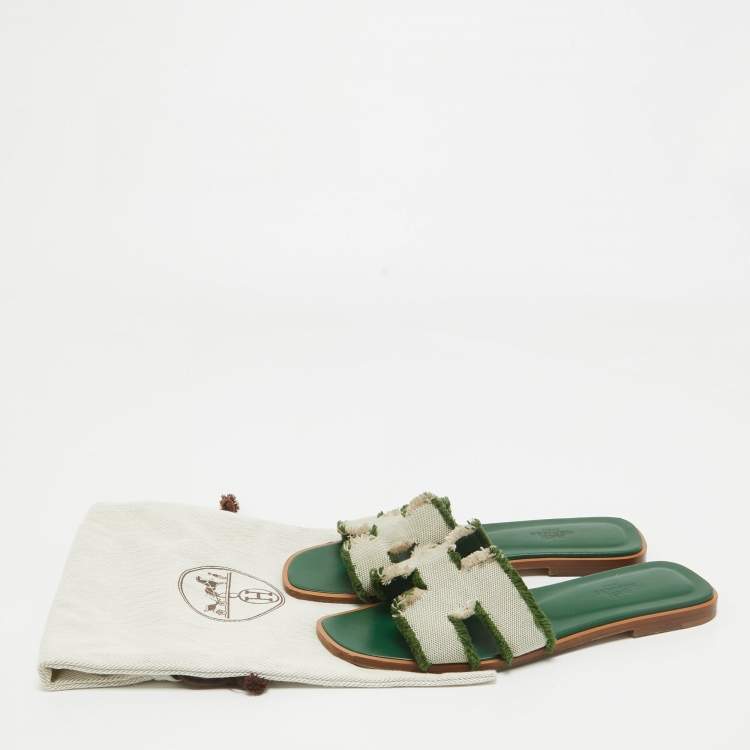 Pre Owned Hermes Green/Beige Leather and Canvas Fringe Oran Flat Slides Size 38