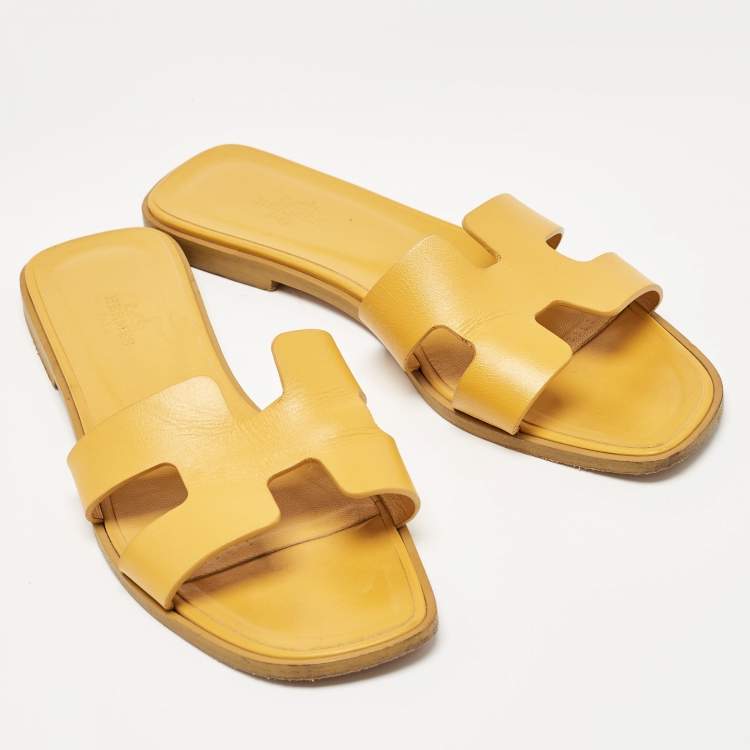 Pre Owned Hermes Yellow Leather Oran Flat Slides Size 38