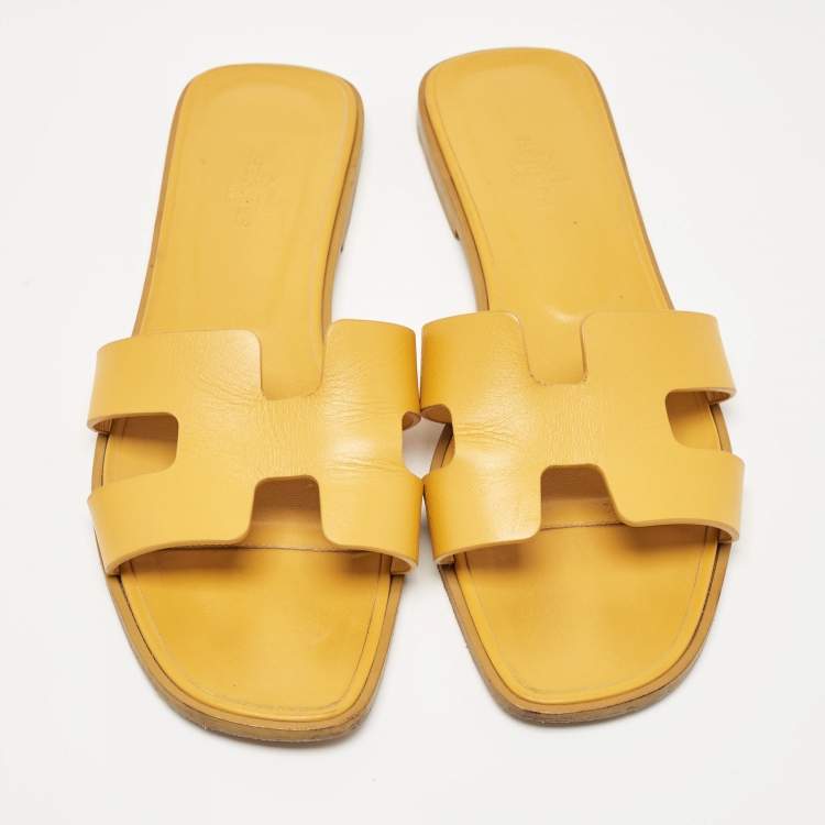 Pre Owned Hermes Yellow Leather Oran Flat Slides Size 38