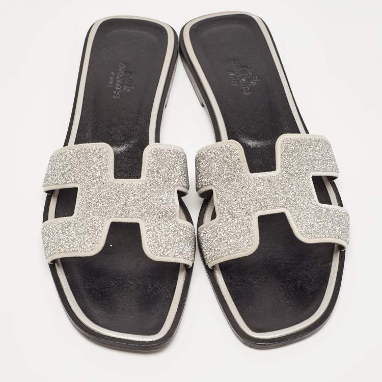Pre Owned Hermes Silver Suede and Glitter Opne Toe Flat Oran Slides Size 38.5