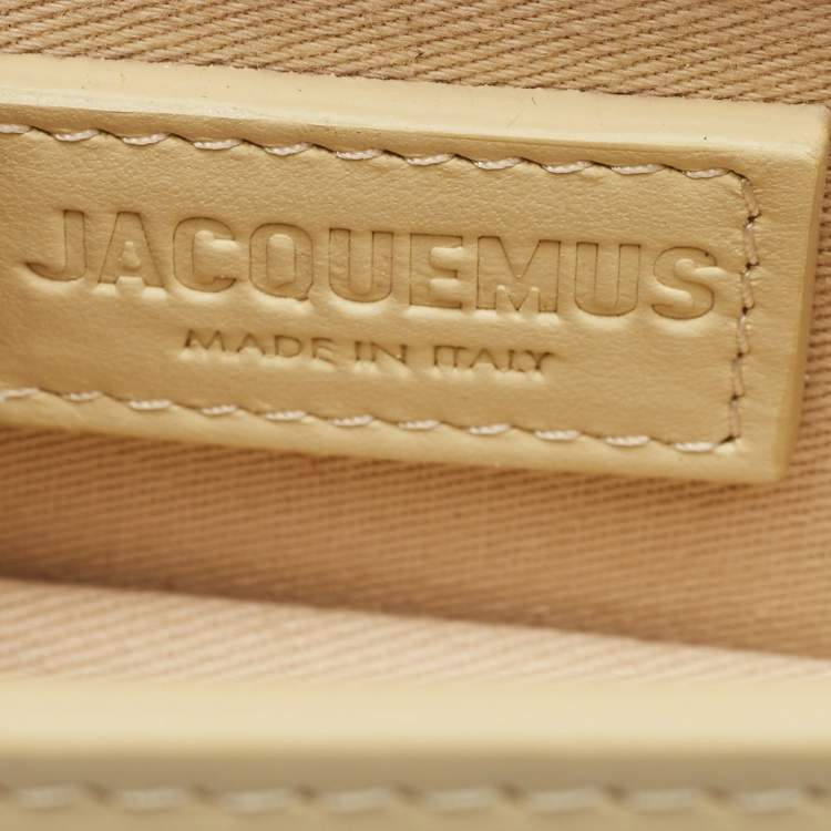 Pre Owned Jacquemus Ivory Leather Mini Le Bambino Top Handle Bag.