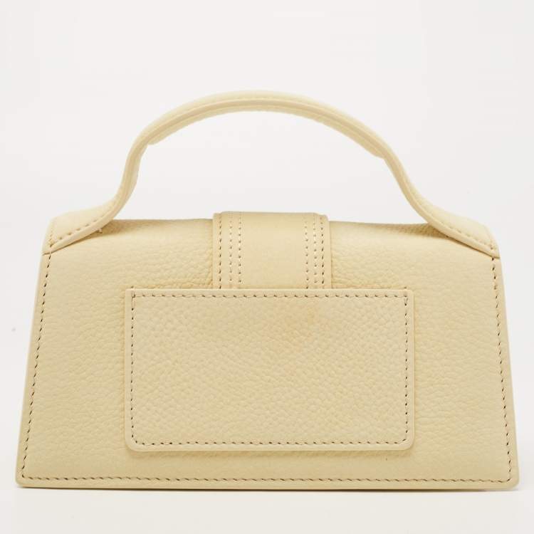 Pre Owned Jacquemus Light Yellow Nubuck Leather Le Bambino Mini Top Handle Bag.