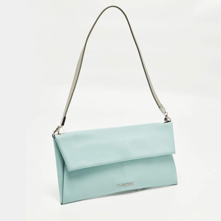 مملوكة مسبقًا حقيبة كلاتش جلدية غطاء لون أزرق/رمادي جيل ساندر