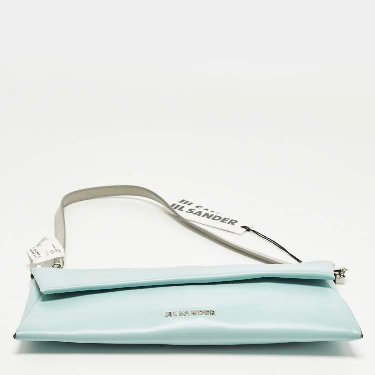 مملوكة مسبقًا حقيبة كلاتش جلدية غطاء لون أزرق/رمادي جيل ساندر