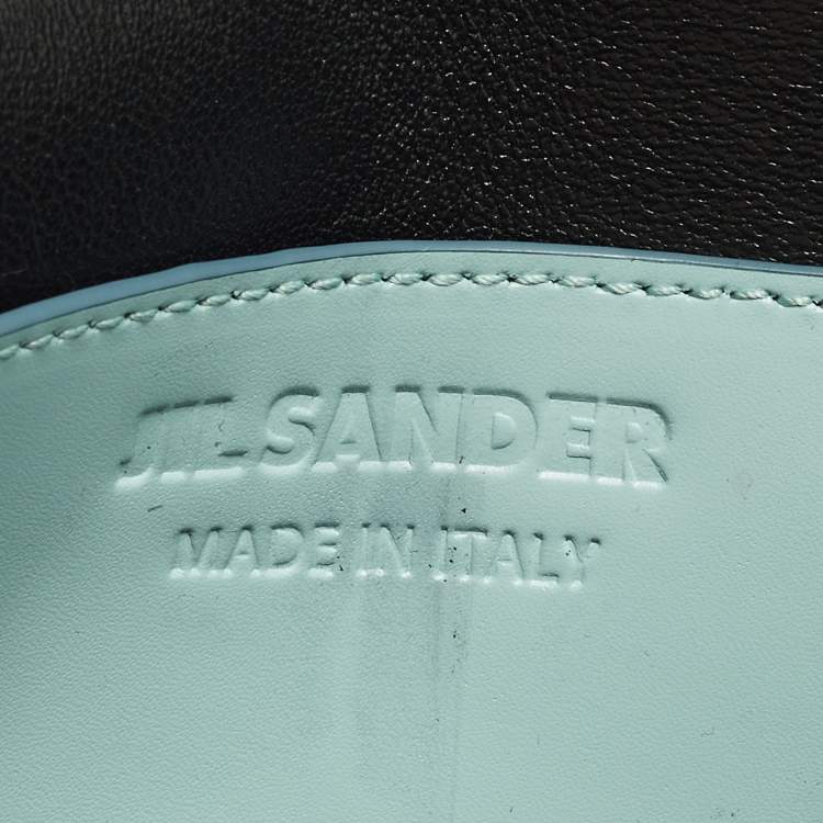 مملوكة مسبقًا حقيبة كلاتش جلدية غطاء لون أزرق/رمادي جيل ساندر