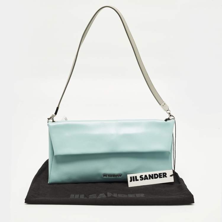 مملوكة مسبقًا حقيبة كلاتش جلدية غطاء لون أزرق/رمادي جيل ساندر