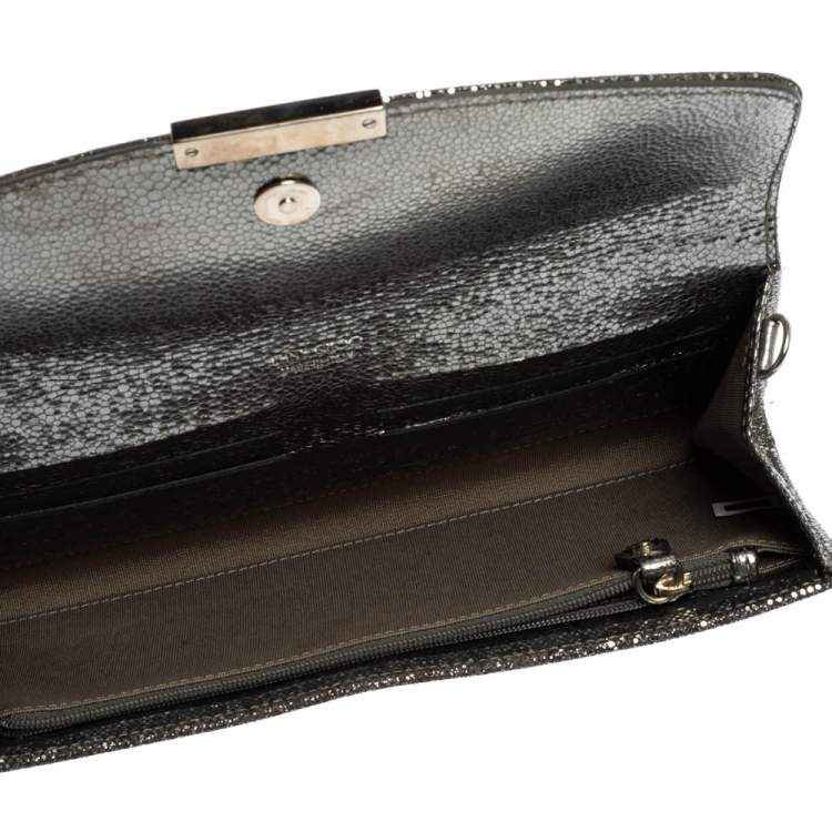 مملوكة مسبقًا Jimmy Choo Silver Lamé Glitter Riane Clutch
