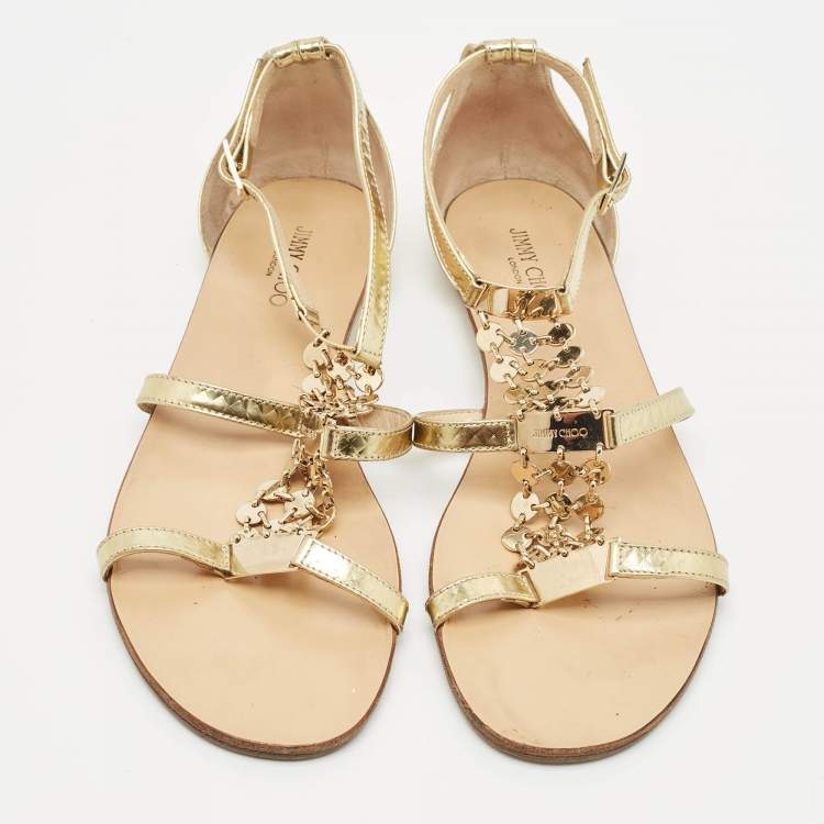 مملوكة مسبقًا Jimmy Choo Gold Patent Leather Embellished T Strap Flat Sandals Size 39