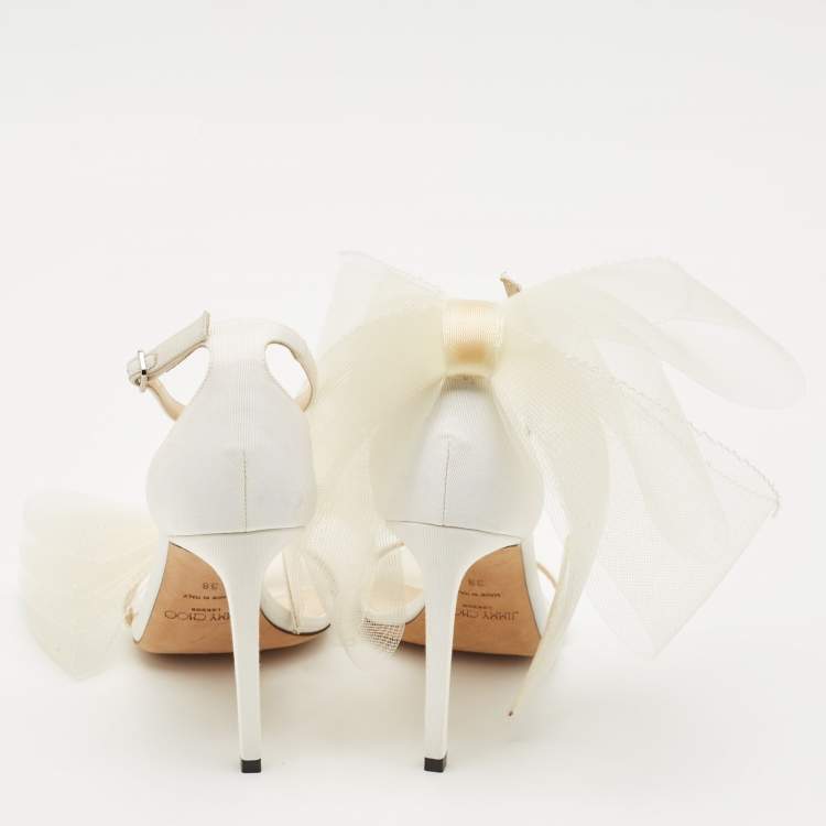 Pre Owned Jimmy Choo White Canvas and Mesh Aveline Bow Ankle Strap Pumps Size 38