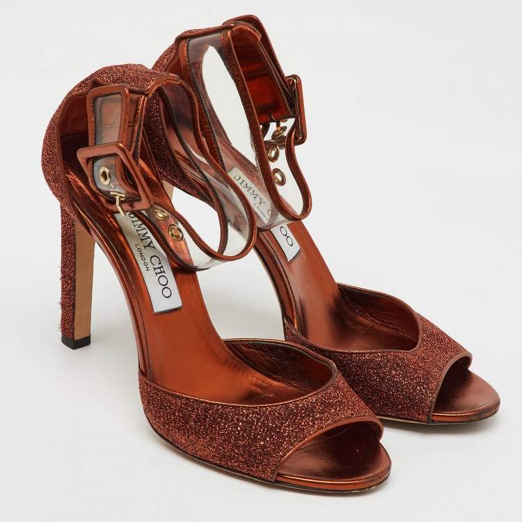 Pre Owned Jimmy Choo Metallic Pop Orange Lurex and PVC Moscow Ankle Strap Sandals Size 39