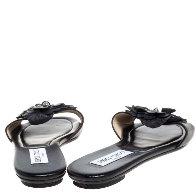 مملوكة مسبقًا Jimmy Choo Black Leather Neave Floral Appliqué Slides Size 38.5