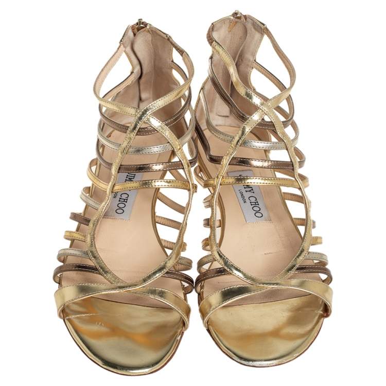 Pre Owned Jimmy Choo Metallic Gold/Silver Leather Gladiator Flat Sandals Size 38.5