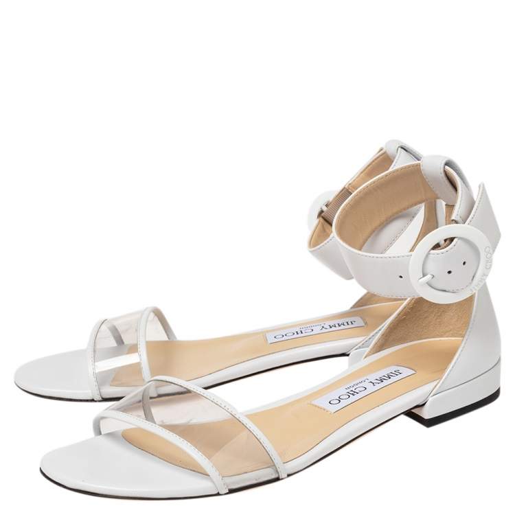 Pre Owned Jimmy Choo White Leather And PVC Jaimie Ankle Strap Flats Size 38