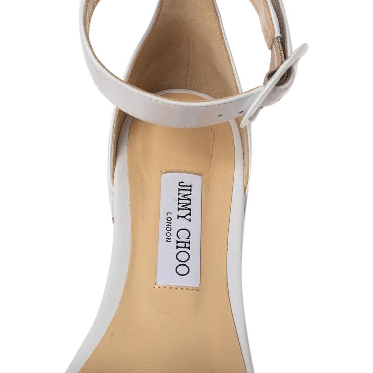 Pre Owned Jimmy Choo White Leather And PVC Jaimie Ankle Strap Flats Size 38