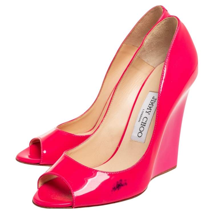 Pre Owned Jimmy Choo Neon Pink Patent Leather Peep-Toe Wedge Pumps Size 38