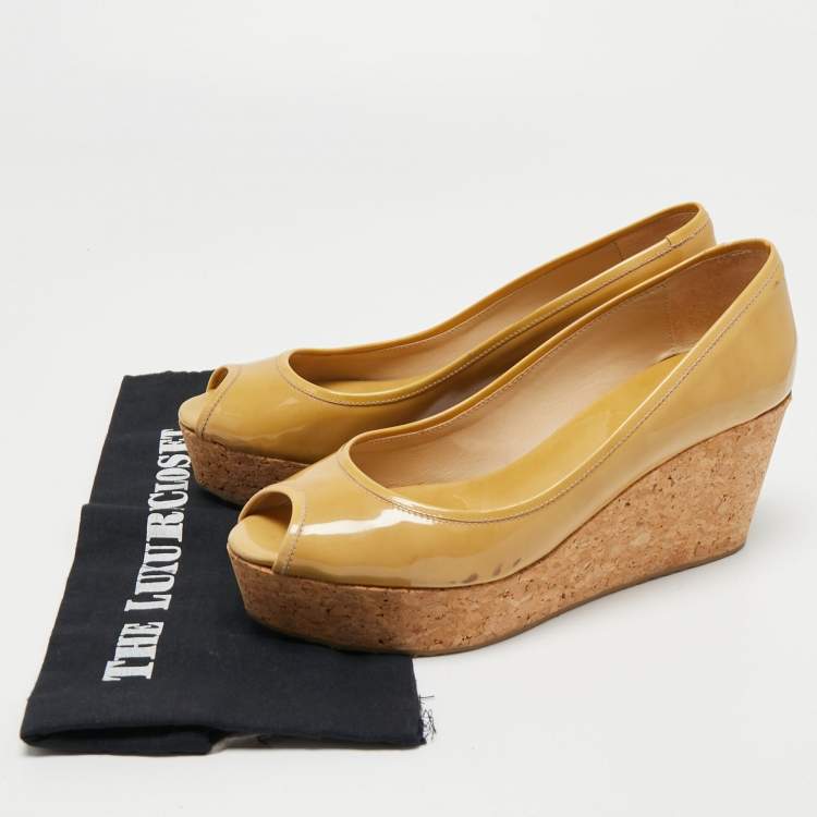 Pre Owned Jimmy Choo Yellow Patent Leather Parley Wedge Pumps Size 41
